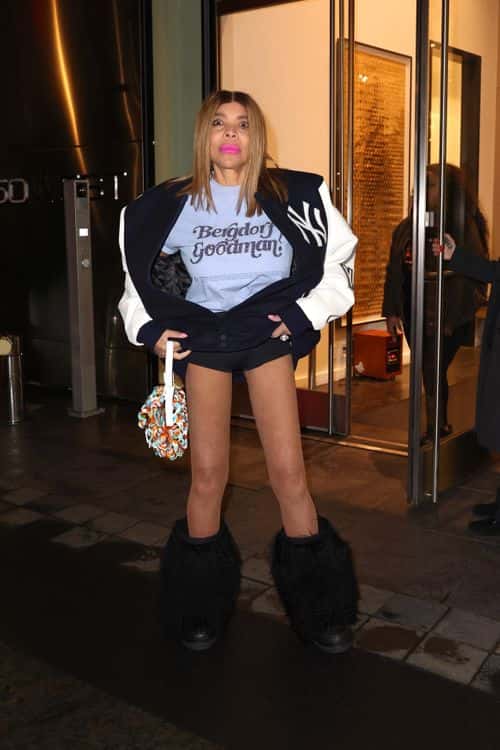 Wendy Williams shows off her Bergdorf Goodman tee as she leaves her apartment and heads to a gym in New York City on February 22, 2023. (Backgrid)