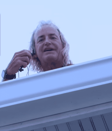 Florida man Rick Loughery sleeps on garage roof to protest FEMA rules after surviving Hurricane Ian (screenshot: Inside Edition/Youtube)