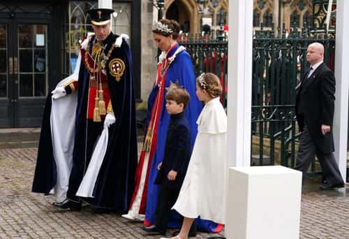 Catherine, Princess of Wales and Prince William, Prince of Wales with Princess Charlotte and Prince Louis arrive at the Coronation of King Charles III and Queen Camilla on May 6, 2023 in London, England. The Coronation of Charles III and his wife, Camilla, as King and Queen of the United Kingdom of Great Britain and Northern Ireland, and the other Commonwealth realms takes place at Westminster Abbey today. Charles acceded to the throne on 8 September 2022, upon the death of his mother, Elizabeth II.