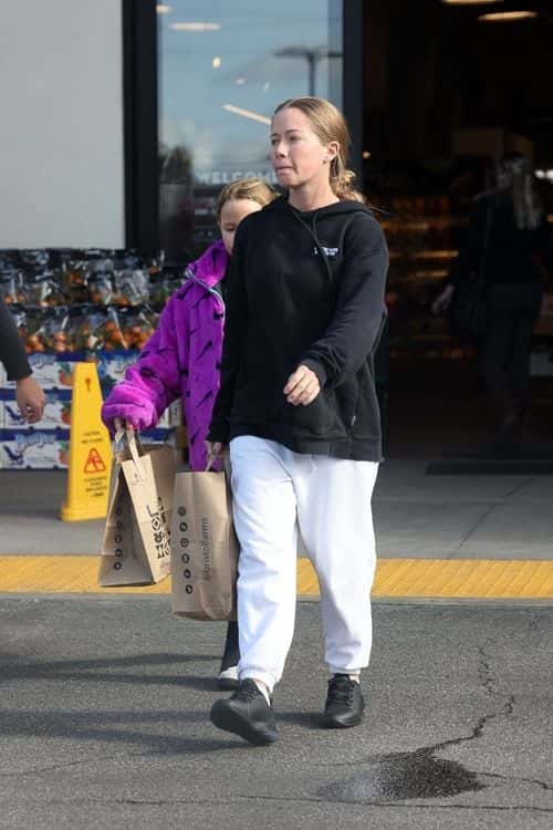 Wilkinson donned a simplistic attire with a black hooded sweatshirt which she paired with a pair of white sweatpants to stay warm in the cooler temperatures.  (Backgrid)
