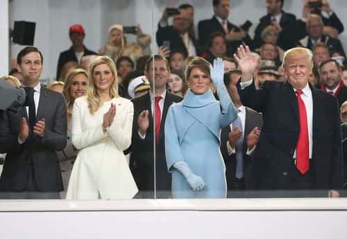 U.S. President Donald Trump (R), stands with his wife first lady Melania Trump, daughter Ivanka Trump and her husband Jared Kushner, inside of the inaugural parade reviewing stand in front of the White House on January 20, 2017 in Washington, DC. Donald Trump was sworn in as the nation's 45th president today.