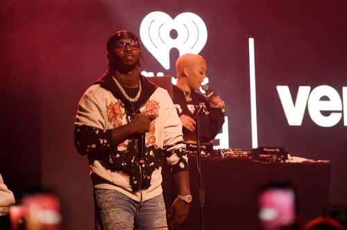 Pop Smoke performs on stage with French Montana at iHeartRadio Live and Verizon Bring You French Montana in New York City at Webster Hall on August 28, 2019.