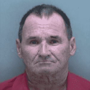 South Florida man Timothy Demarse allegedly held two construction workers at gunpoint out of fear that they would ruin his grass (@abc7swfl798/Youtube)
