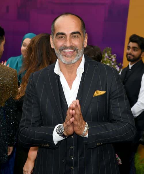 Navid Negahban arrives at the premiere of Disney's 