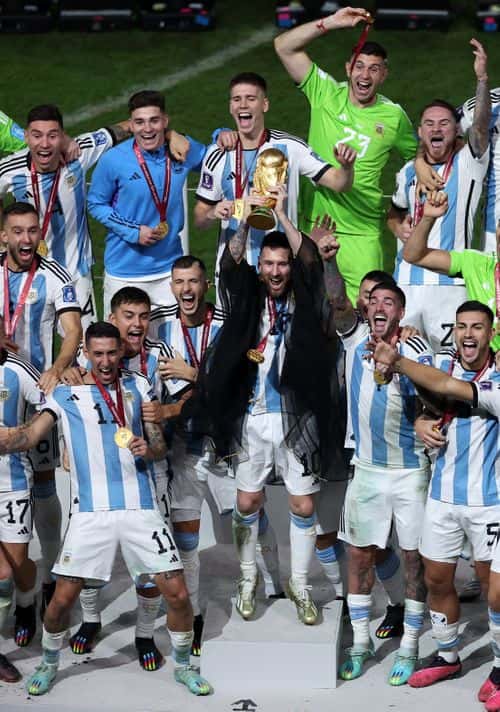 Lionel Messi of Argentina lifts the FIFA World Cup Trophy after the team's victory during the FIFA World Cup Qatar 2022 Final match between Argentina and France at Lusail Stadium on December 18, 2022 in Lusail City, Qatar.