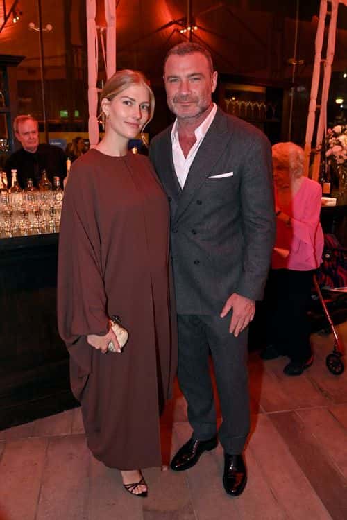(L-R) Taylor Neisen and Liev Schreiber attend the National Geographic, Disney+, and Hulu Premiere of “A Small Light” at Alice Tully Hall on April 25, 2023 in New York City.