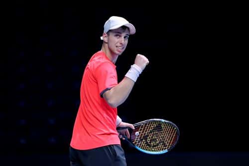 Adrian Andreev of Bulgaria reacts in his Men's Singles second round match against Alexei Popyrin of Australia on day three of the Singapore Tennis Open at the OCBC Arena on February 24, 2021 in Singapore.