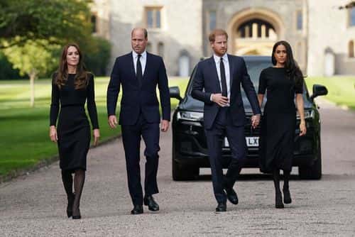 Catherine, Princess of Wales, Prince William, Prince of Wales, Prince Harry, Duke of Sussex, and Meghan, Duchess of Sussex on the long Walk at Windsor Castle on September 10, 2022 in Windsor, England. Crowds have gathered and tributes left at the gates of Windsor Castle to Queen Elizabeth II, who died at Balmoral Castle on 8 September, 2022.