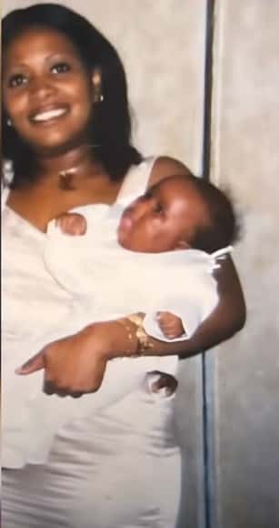 Kai Cenat and his mom when he was a baby (GQ/YouTube) 