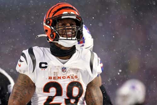 Joe Mixon #28 of the Cincinnati Bengals reacts against the Buffalo Bills during the third quarter in the AFC Divisional Playoff game at Highmark Stadium on January 22, 2023 in Orchard Park, New York.