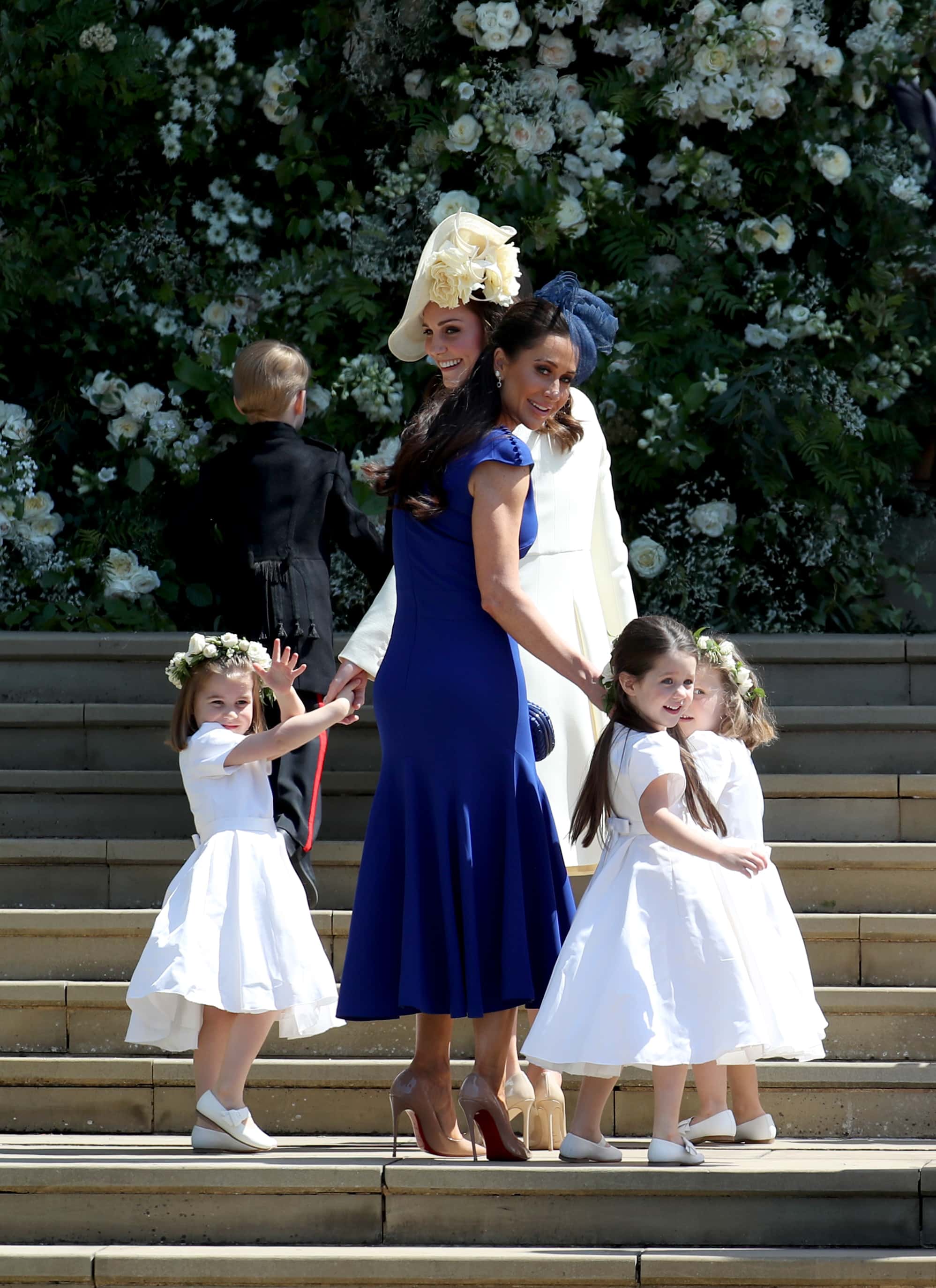 Princess Charlotte of Cambridge, Prince George of Cambridge, Catherine, Duchess of Cambridge, Jessica Mulroney, Ivy Mulroney and Florence van Cutsem after the wedding of Prince Harry and Ms. Meghan Markle at St George's Chapel at Windsor Castle on May 19, 2018 in Windsor, England. (Photo by Jane Barlow - WPA Pool/Getty Images)