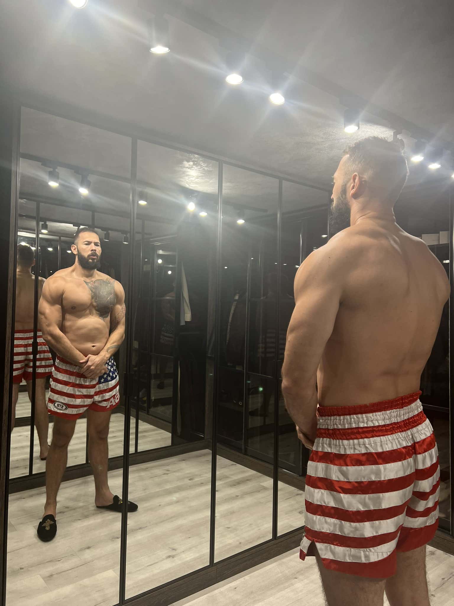 Tate allegedly posted the remark along with other shirtless images of himself engaging in stereotypically macho activities including smoking a cigar (Andrew Tate/Twitter)