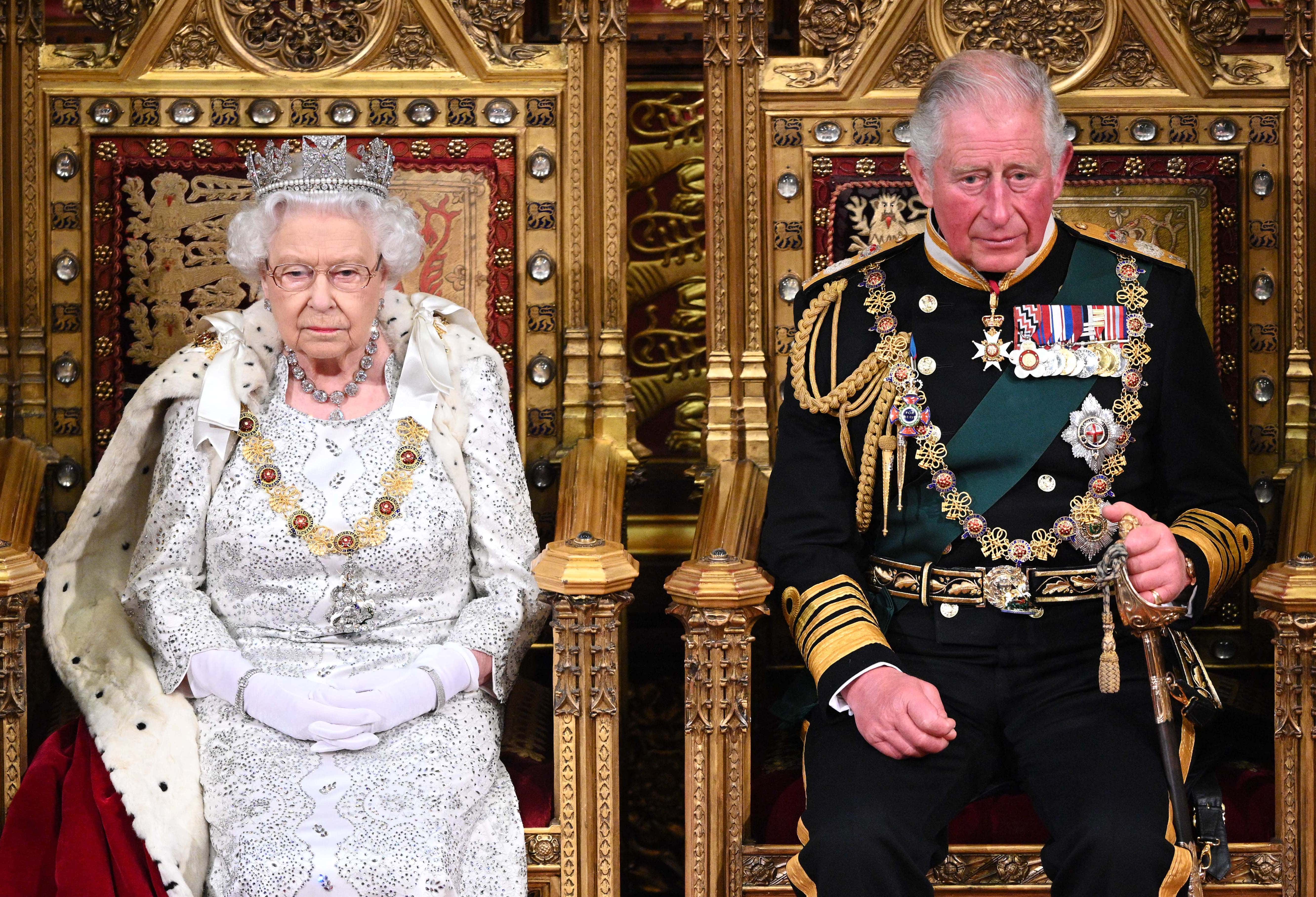 Queen Elizabeth II and Prince Charles, Prince of Wales during the State Opening of Parliament at the Palace of Westminster on October 14, 2019 in London, England. The Queen's speech is expected to announce plans to end the free movement of EU citizens to the UK after Brexit, new laws on crime, health and the environment.