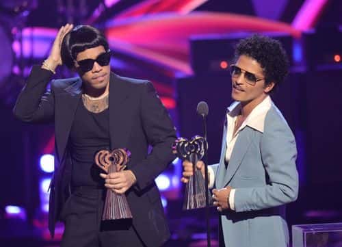(L-R) Anderson .Paak and Bruno Mars of Silk Sonic accept Best Duo/Group of the Year onstage at the 2022 iHeartRadio Music Awards at The Shrine Auditorium in Los Angeles, California on March 22, 2022.