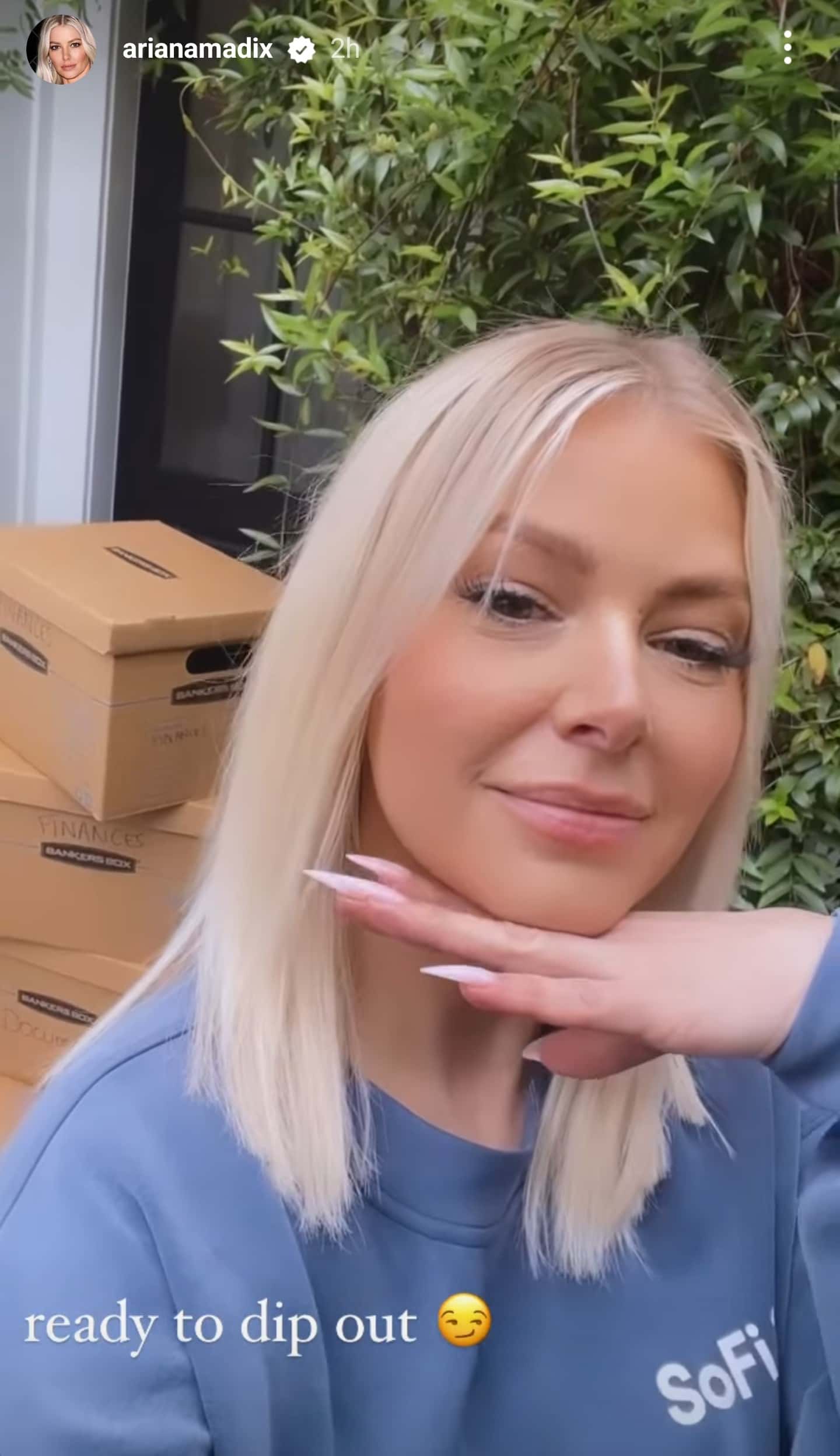 Ariana Madix shared a celebratory video to her Instagram Story of her posing in front of a stack of boxes while moving out of her shared home with Tom Sandoval (arianamadix/Instagram)