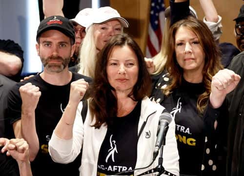 (L-R) Ben Whitehair, Frances Fisher, SAG President Fran Drescher, Joely Fisher, National Executive Director, and SAG-AFTRA members are seen as SAG-AFTRA National Board holds a press conference for vote on recommendation to call a strike regarding the TV/Theatrical contract at SAG-AFTRA on July 13, 2023 in Los Angeles, California.