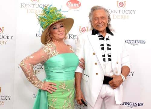 Musician Tanya Tucker (L) and executive Peter Nygard attend the 142nd Kentucky Derby at Churchill Downs on May 07, 2016 in Louisville, Kentucky.