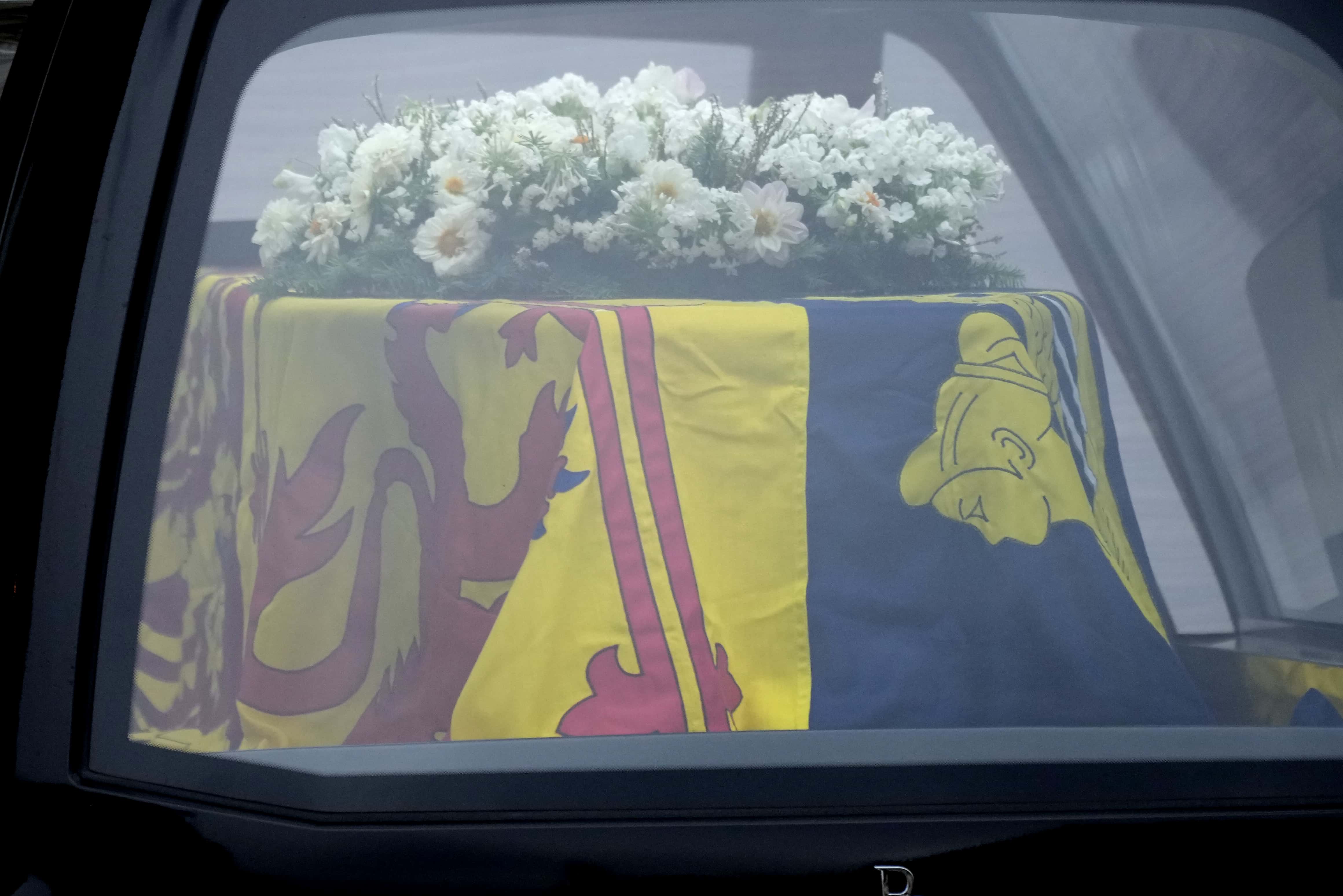 The cortege carrying the coffin of the late Queen Elizabeth II is driven through Edinburgh on its way to Palace of Holyroodhouse on September 11, 2022 in Edinburgh, United Kingdom. Elizabeth Alexandra Mary Windsor was born in Bruton Street, Mayfair, London on 21 April 1926. She married Prince Philip in 1947 and ascended the throne of the United Kingdom and Commonwealth on 6 February 1952 after the death of her Father, King George VI. Queen Elizabeth II died at Balmoral Castle in Scotland on September 8, 2022, and is succeeded by her eldest son, King Charles III.