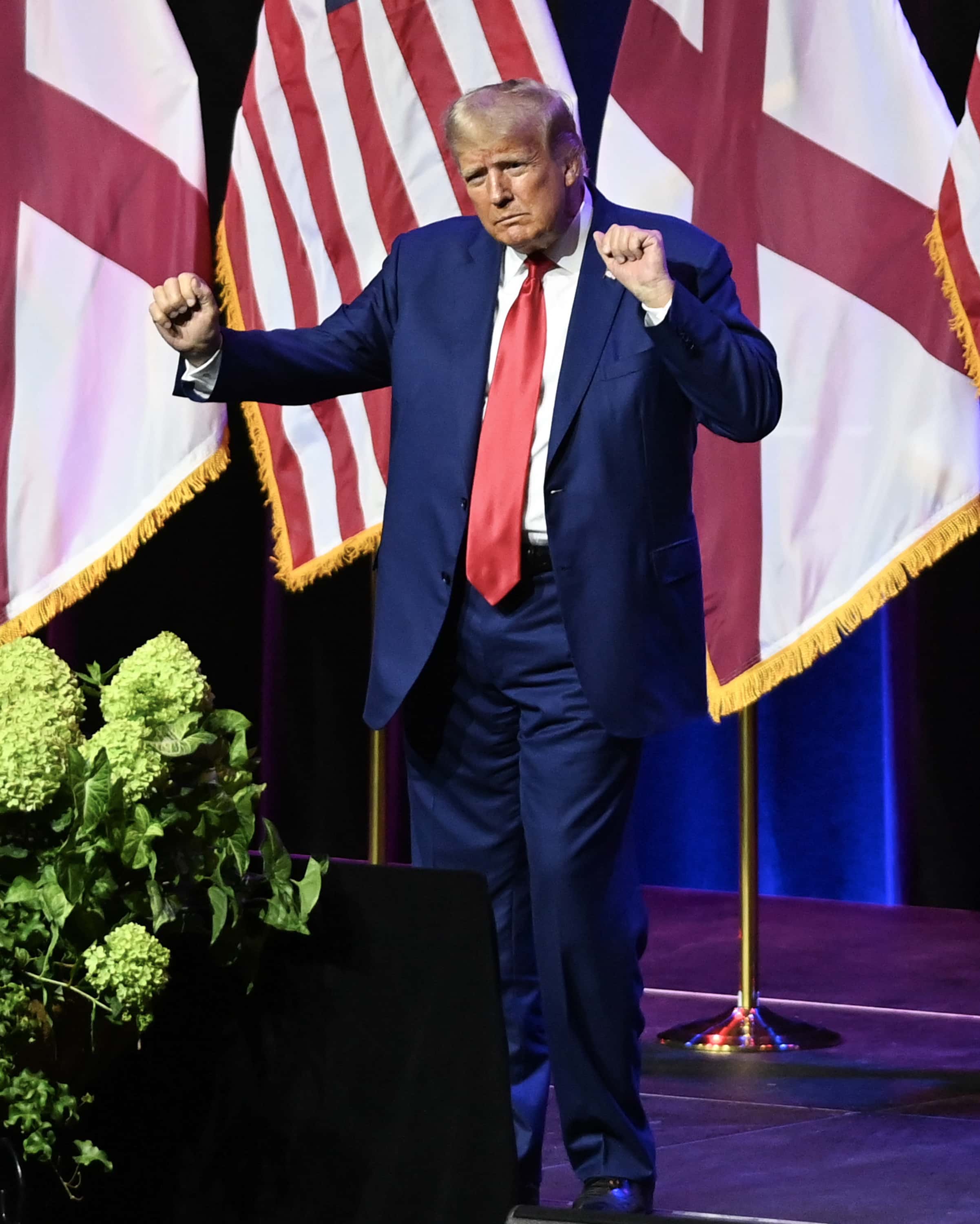 MONTGOMERY, ALABAMA - AUGUST 4: Former U.S. President Donald Trump dances on stage during the Alabama Republican Party’s 2023 Summer meeting at the Renaissance Montgomery Hotel on August 4, 2023 in Montgomery, Alabama. Trump's appearance in Alabama comes one day after he was arraigned on federal charges in Washington, D.C. for his alleged efforts to overturn the 2020 election. (Photo by Julie Bennett/Getty Images)