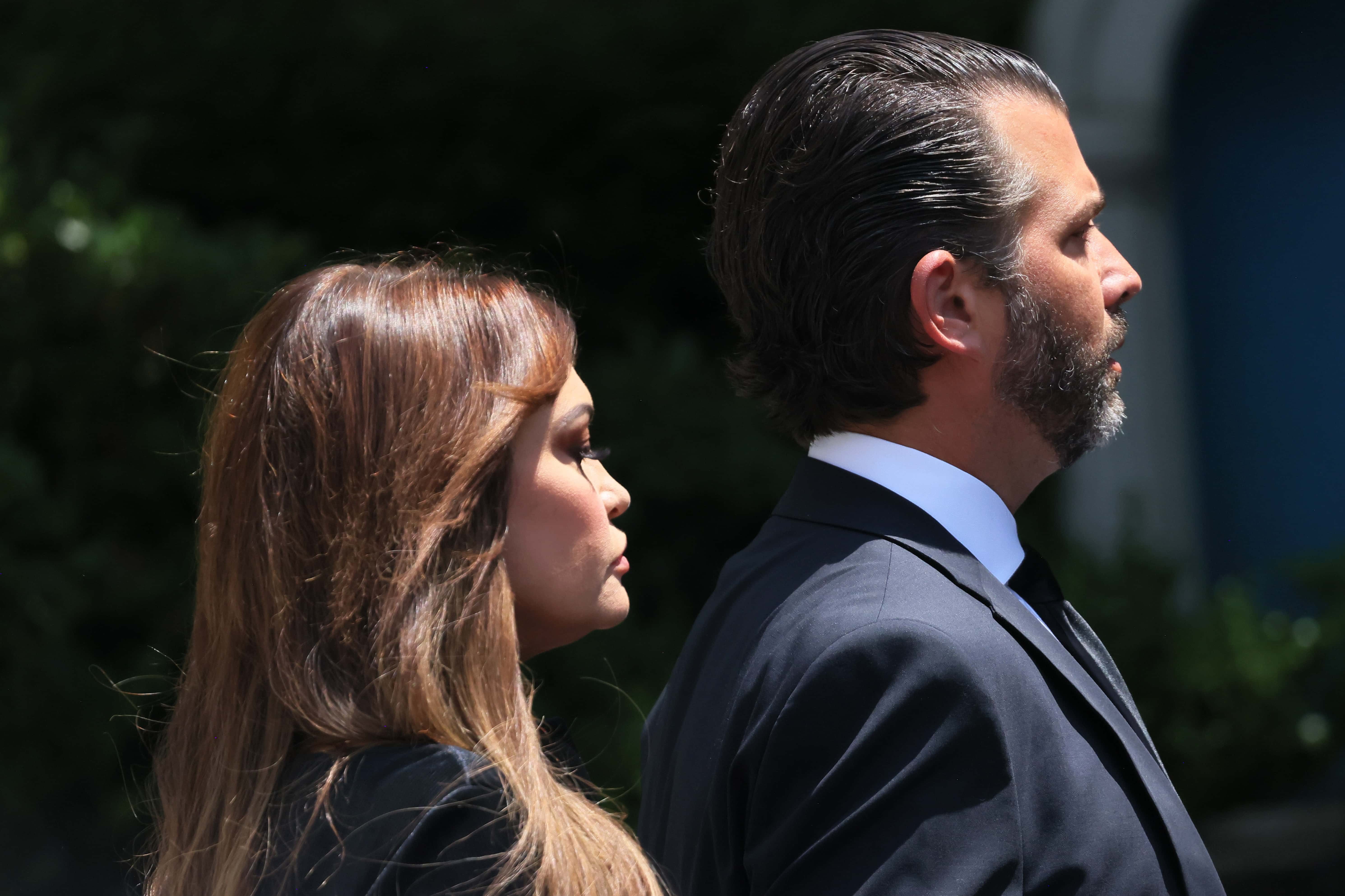 Kimberly Guilfoyle and Donald Trump Jr. arrive for the funeral of his mother Ivana Trump at St. Vincent Ferrer Roman Catholic Church July 20, 2022 in New York City. Trump, the first wife of former U.S. President Donald Trump,  died at the age of 73 after a fall down the stairs of her Manhattan home.