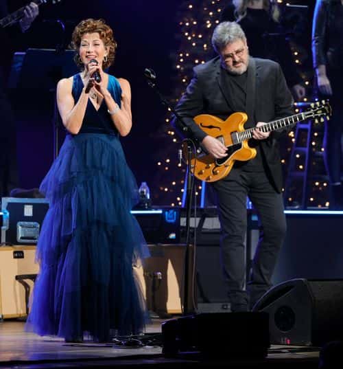 Amy Grant and Vince Gill perform at the Ryman Auditorium on December 13, 2021 in Nashville, Tennessee.