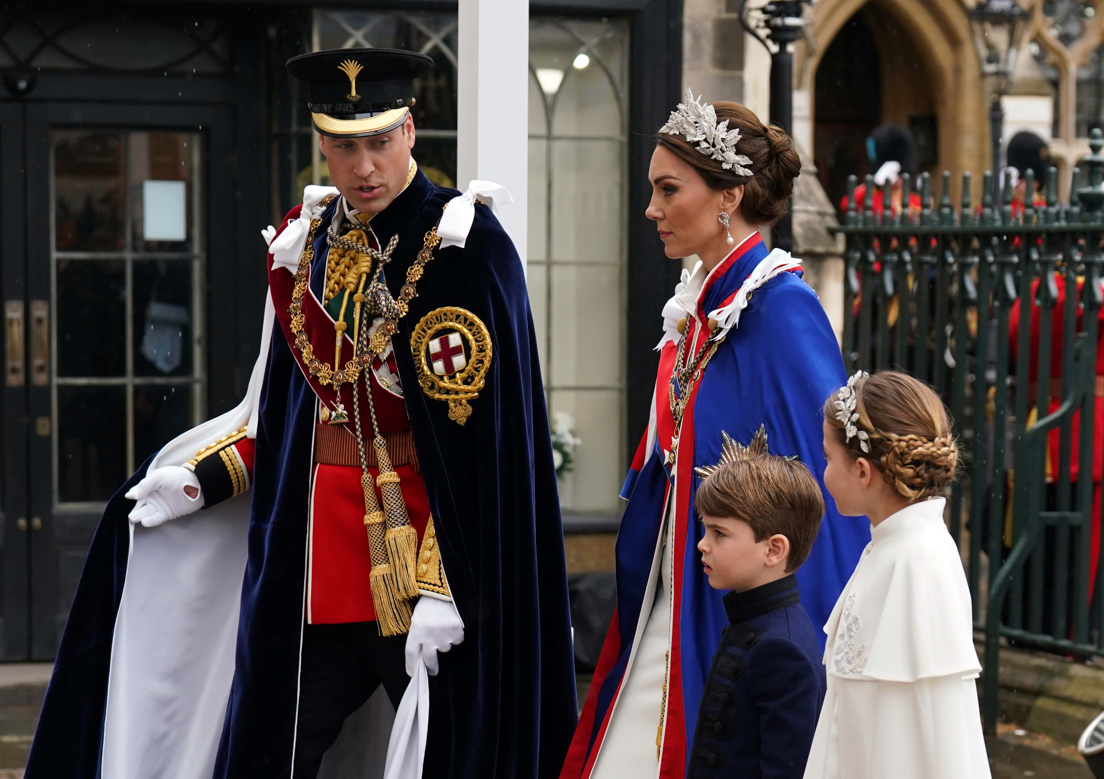 Catherine, Princess of Wales and Prince William, Prince of Wales with Princess Charlotte and Prince Louis arrive at the Coronation of King Charles III and Queen Camilla on May 6, 2023 in London, England. The Coronation of Charles III and his wife, Camilla, as King and Queen of the United Kingdom of Great Britain and Northern Ireland, and the other Commonwealth realms takes place at Westminster Abbey today. Charles acceded to the throne on 8 September 2022, upon the death of his mother, Elizabeth II. (Photo by Andrew Milligan - WPA Pool/Getty Images)