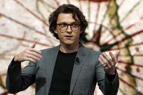 Actor Tom Holland speaks during a Sony media event for CES 2022 at the Mandalay Bay Convention Center on January 4, 2022 in Las Vegas, Nevada. CES, the world's largest annual consumer technology trade show, is being held in person from January 5-7, with some companies deciding to participate virtually only or canceling altogether due to concerns over the recent surge in cases of the omicron variant of Covid-19.