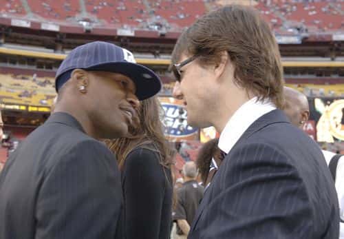 Jamie Foxx and Tom Cruise on the field prior to the Minnesota Vikings and Washington Redskins game at FedEx Field in Washington D.C. on September 11, 2006.  (Photo by Al Messerschmidt/Getty Images)