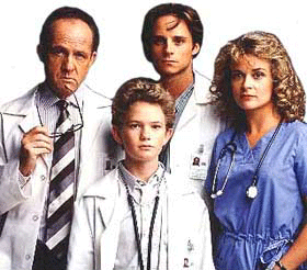 From left to right, Lawrence Pressman as Dr. Canfield, Neil Patrick Harris as Doogie Howser, Mitchell Anderson as Dr. McGuire and Kathryn Layng as Nurse Spaulding (Wikipedia)