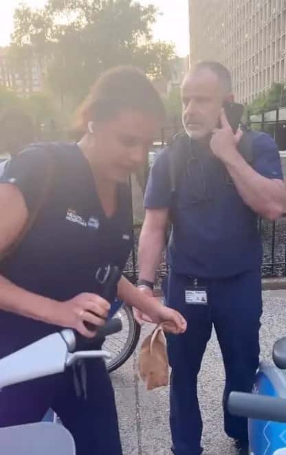 The woman finally left the bike after her apparent co-worker calmed her down and advised her to take another bike. (Tariq Nasheed/Twitter)