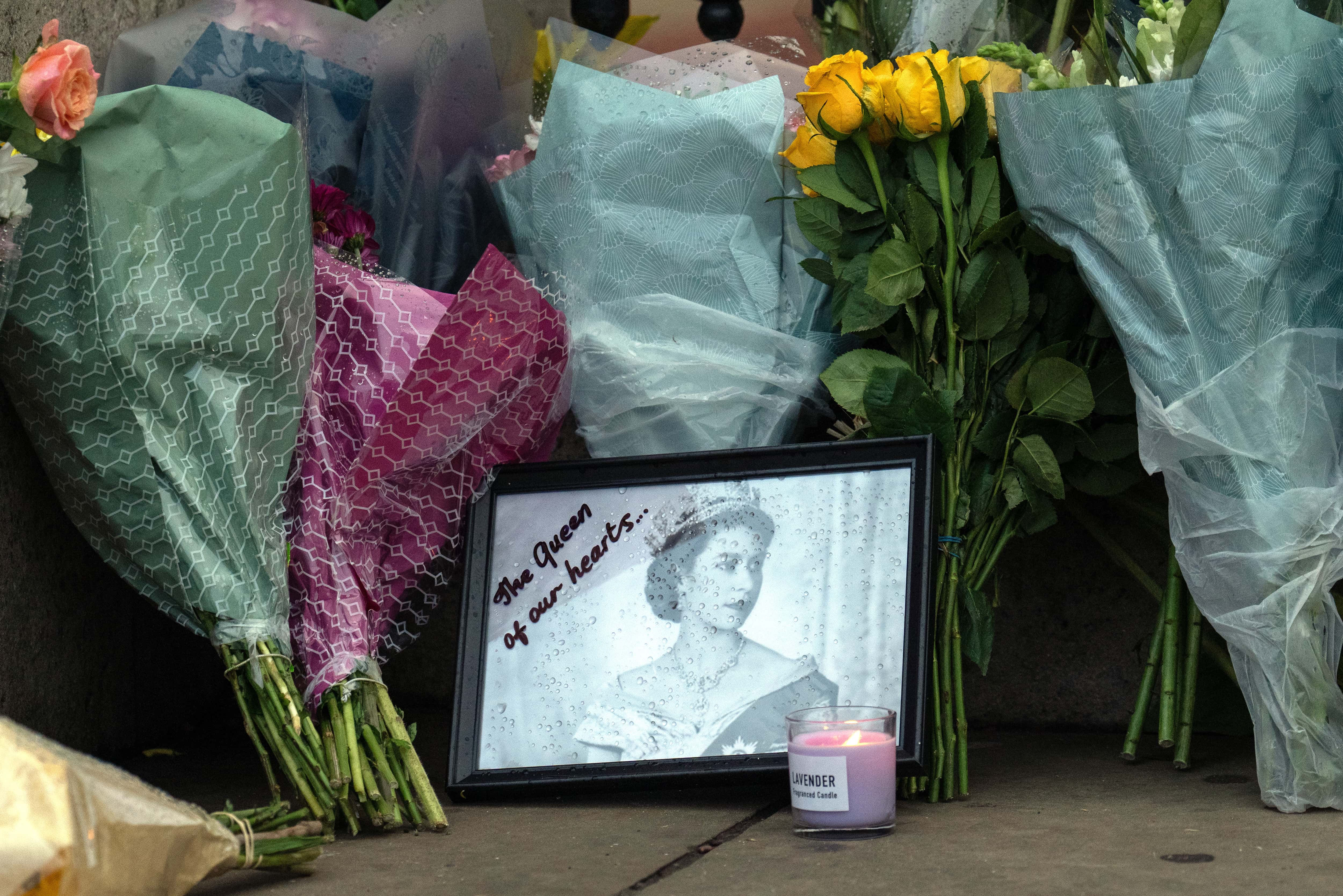 Flowers and tributes to Queen Elizabeth II are placed outside Buckingham Palace on September 9, 2022 in London, United Kingdom. Elizabeth Alexandra Mary Windsor was born in Bruton Street, Mayfair, London on 21 April 1926. She married Prince Philip in 1947 and acceded the throne of the United Kingdom and Commonwealth on 6 February 1952 after the death of her Father, King George VI. Queen Elizabeth II died at Balmoral Castle in Scotland on September 8, 2022, and is succeeded by her eldest son, King Charles III. (Photo by Carl Court/Getty Images)