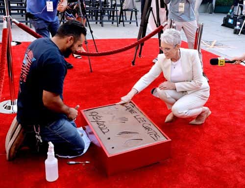 Jamie Lee Curtis attends the Jamie Lee Curtis Hand and Footprint In Cement Ceremony at TCL Chinese Theatre on October 12, 2022 in Hollywood, California.