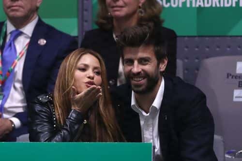 Singer Shakira (L) and her husband and footballer Gerard Pique of FC Barcelona (R) react in the stands as they watch the singles final match between Rafael Nadal of Spain and Denis Shapovalov of Canada during Day Seven of the 2019 Davis Cup at La Caja Magica on November 24, 2019 in Madrid, Spain. (Photo by Alex Pantling/Getty Images)
