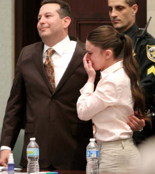 Casey Anthony cries with her attorney Jose Baez after she was acquitted of murder charges at the Orange County Courthouse on July 5, 2011 in Orlando, Florida. Casey Anthony had been accused of murdering her two-year-old daughter Caylee in 2008 and was found not guilty of manslaughter in the first degree.