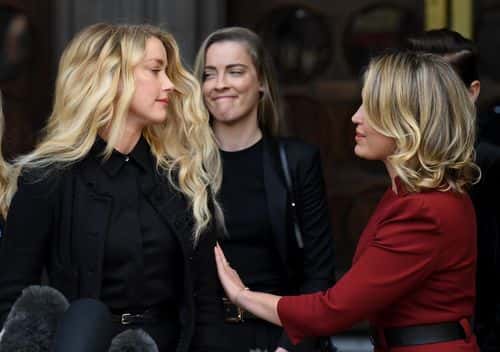 Amber Heard and her lawyer Jennifer Robinson (R) after speaking outside the Royal Courts of Justice, the Strand on July 28, 2020 in London, England. The Hollywood actor is suing News Group Newspapers (NGN) and the Sun's executive editor, Dan Wootton, over an article published in 2018 that referred to him as a