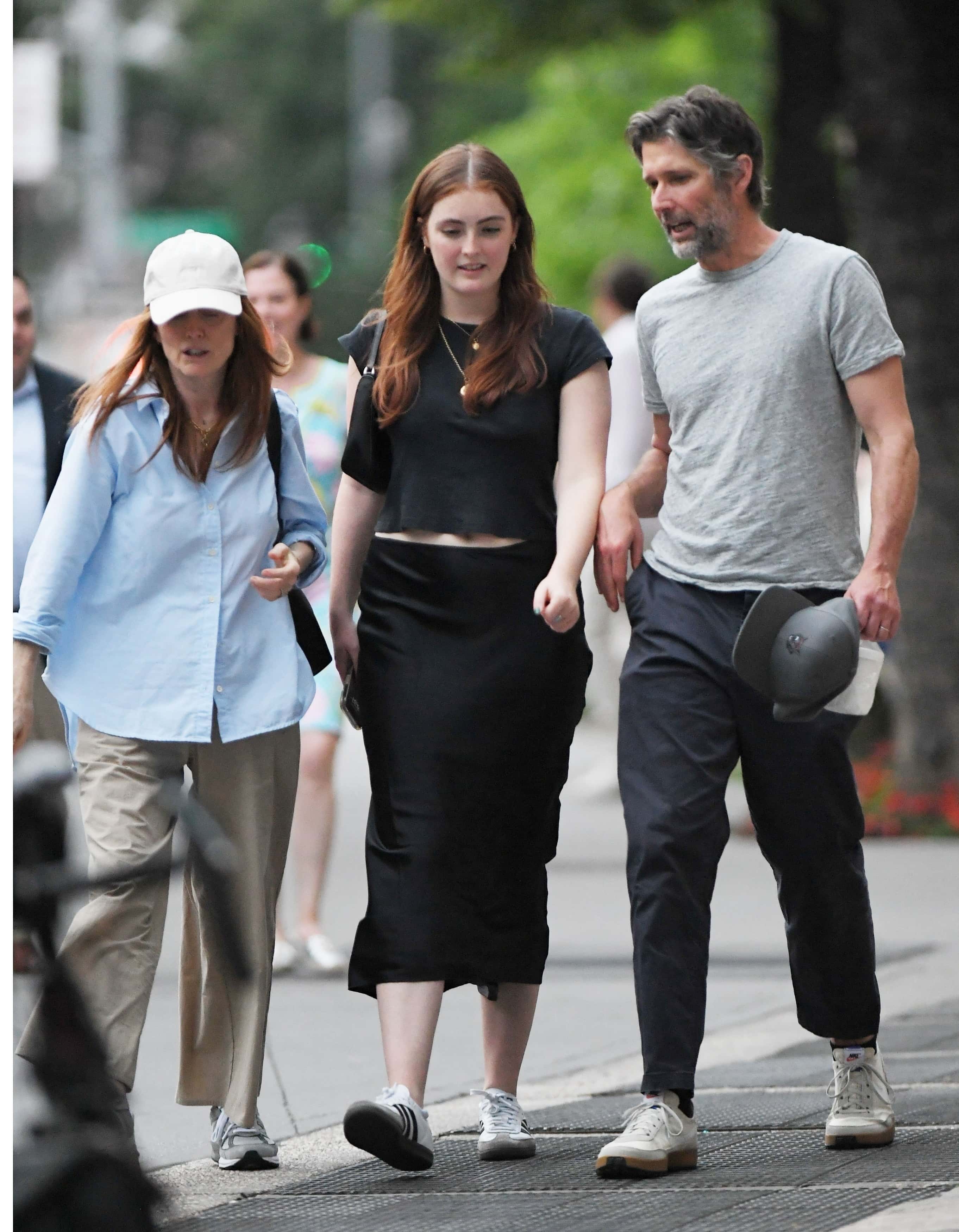 Julianne Moore, husband Bart Freundlich, and daughter Liv spotted in New York City on June 29 (Backgrid)