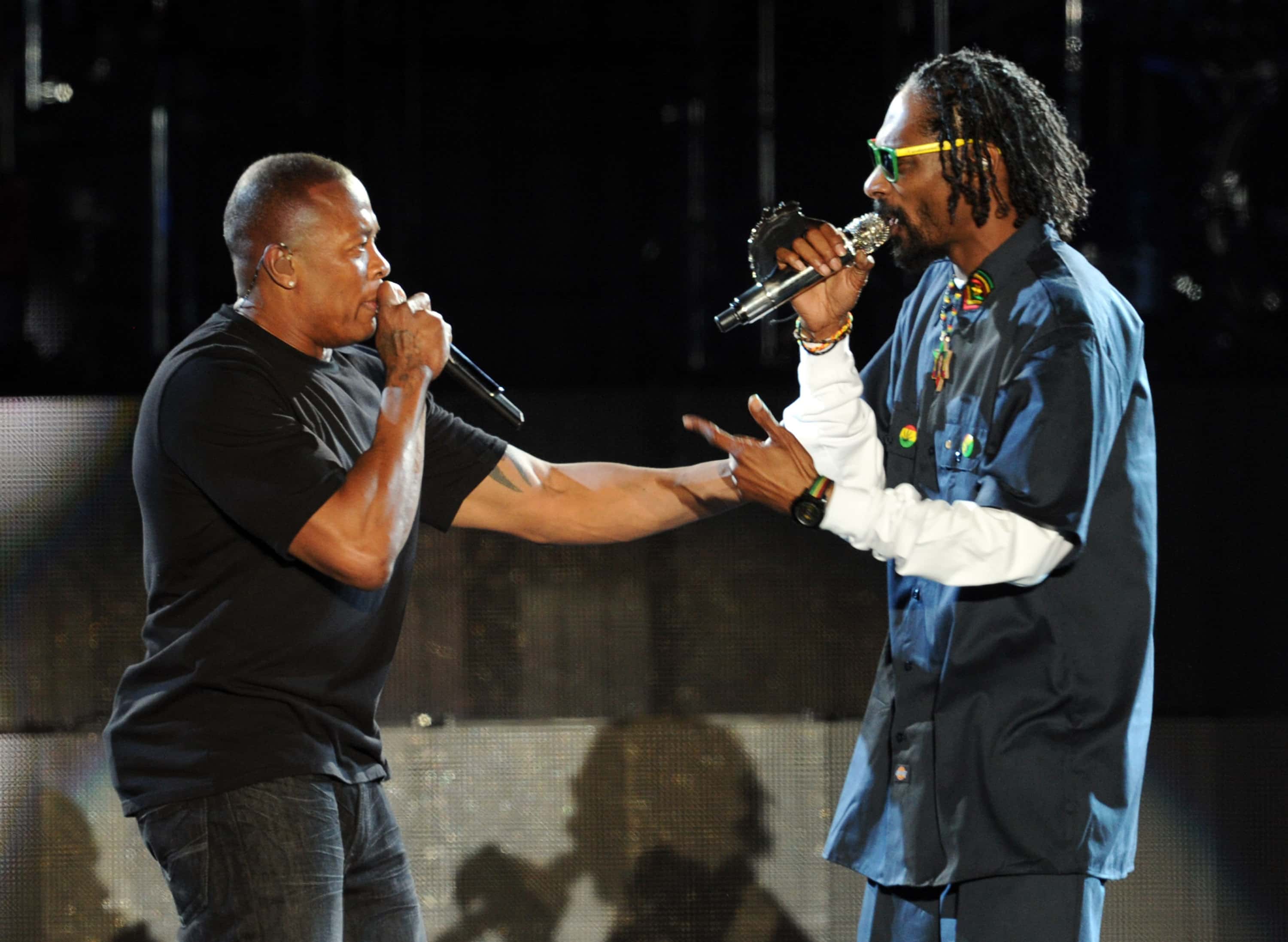 Rappers Dr. Dre (L) and Snoop Dogg perform onstage during day 3 of the 2012 Coachella Valley Music & Arts Festival at the Empire Polo Field on April 15, 2012 in Indio, California.
