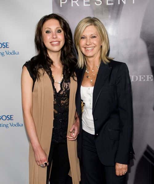 Olivia Newton-John (R) with her daughter Chloe Lattanzi arrive at a book party for