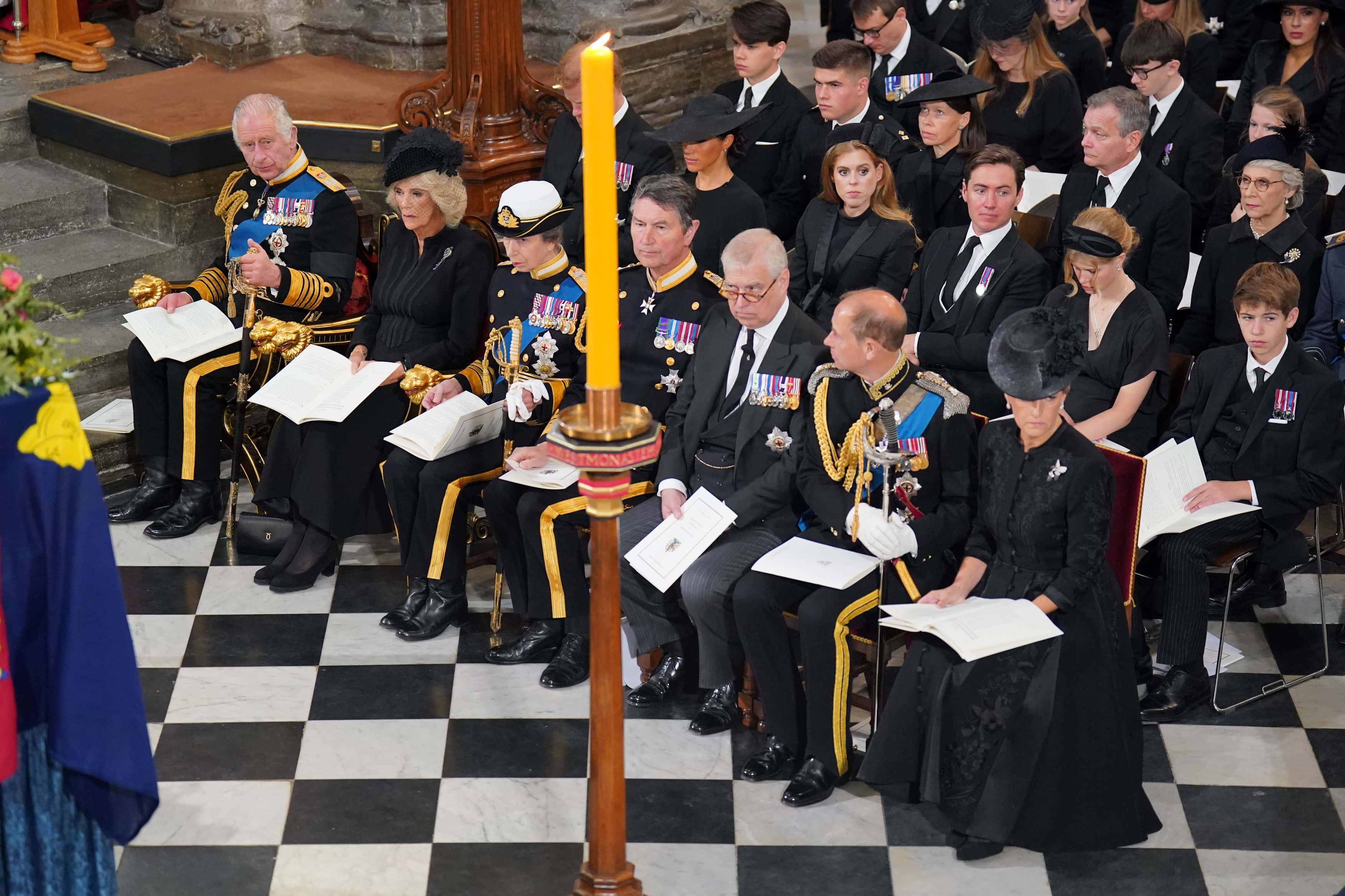 (front row) King Charles III, Camilla, Queen Consort, the Princess Royal, Vice Admiral Sir Tim Laurence, the Duke of York, the Earl of Wessex, the Countess of Wessex, (second row) the Duke of Sussex, the Duchess of Sussex, Princess Beatrice, Edoardo Mapelli Mozzi and Lady Louise Windsor, and (third row) Samuel Chatto, Arthur Chatto, Lady Sarah Chatto, Daniel Chatto in front of the coffin at the State Funeral of Queen Elizabeth II at Westminster Abbey on September 19, 2022 in London, England. Elizabeth Alexandra Mary Windsor was born in Bruton Street, Mayfair, London on 21 April 1926. She married Prince Philip in 1947 and ascended the throne of the United Kingdom and Commonwealth on 6 February 1952 after the death of her Father, King George VI. Queen Elizabeth II died at Balmoral Castle in Scotland on September 8, 2022, and is succeeded by her eldest son, King Charles III. (Photo by Dominic Lipinski - WPA Pool/Getty Images)