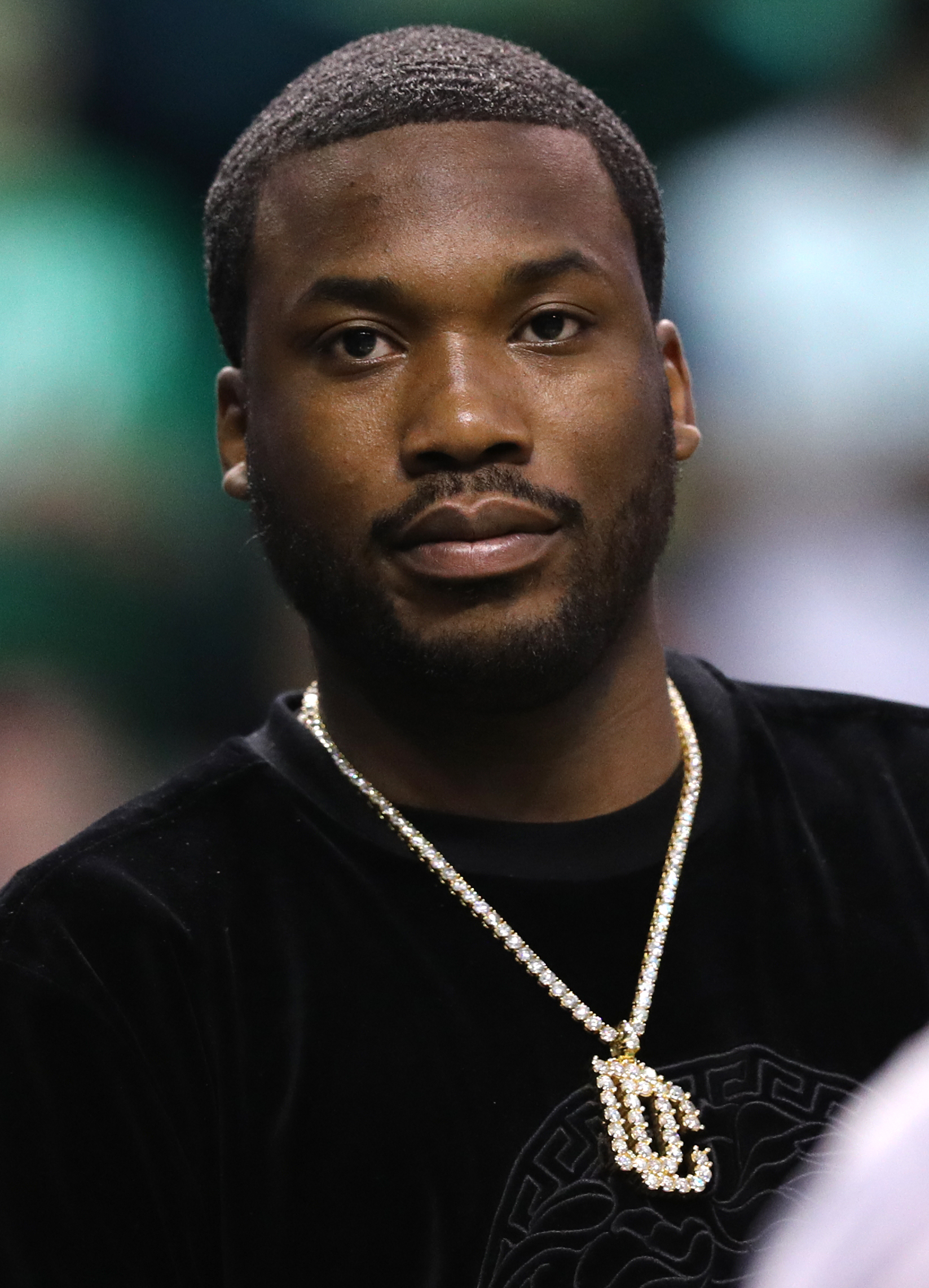Rapper Meek Mill looks on during Game Two of the Eastern Conference Second Round of the 2018 NBA Playoffs between the Boston Celtics and the Philadelphia 76ers at TD Garden on May 3, 2018 in Boston, Massachusetts. The Celtics defeat the 76ers 108-103.