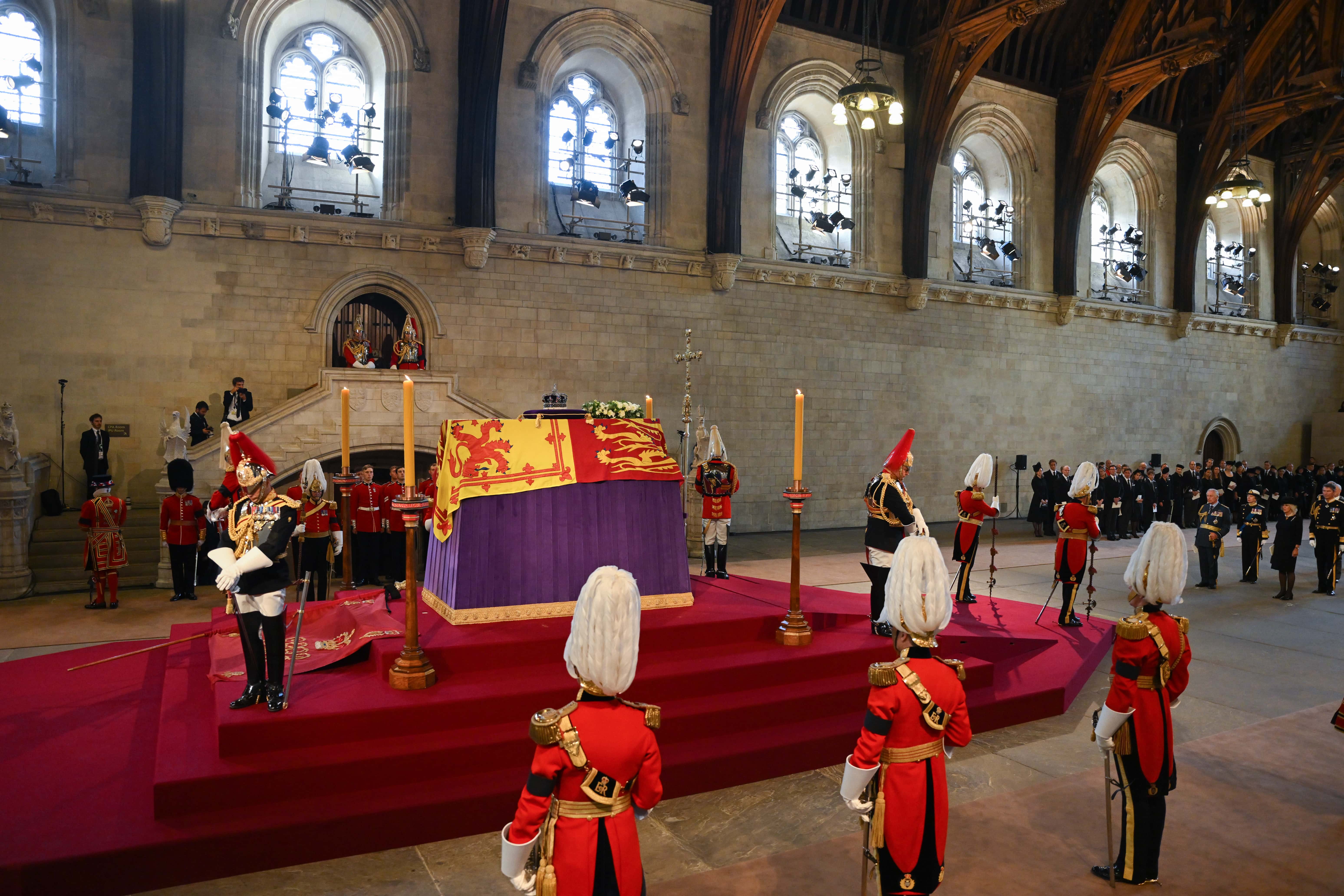 King Charles III, Anne, Princess Royal, Prince Edward, Earl of Wessex, Prince William, Prince of Wales, Prince Andrew, Duke of York, Camilla, Queen Consort, Sir Timothy Laurence, Mr Peter Phillips, Sophie, Countess of Wessex, Catherine, Princess of Wales, Princess Beatrice and Prince Edward, Duke of Kent are seen inside the Palace of Westminster as the First Watch begins their duty during the Lying-in State of Queen Elizabeth II on September 14, 2022 in London, England. Queen Elizabeth II's coffin is taken in procession on a Gun Carriage of The King's Troop Royal Horse Artillery from Buckingham Palace to Westminster Hall where she will lay in state until the early morning of her funeral. Queen Elizabeth II died at Balmoral Castle in Scotland on September 8, 2022, and is succeeded by her eldest son, King Charles III.