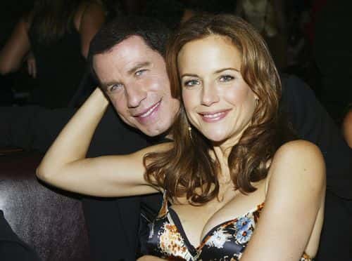 Actors John Travolta and his wife Kelly Preston pose at the after party for the premiere of Lions Gates'