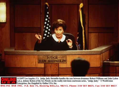 Judge Judy Sheindlin Handles The Case Between Drummer Robert Williams And John Lydon (A.K.A. Johnny Rotten Of The Sex Pistols) In The Reality Television Courtroom Series