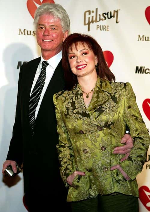 Actress Naomi Judd (R) and husband Larry Strickland attend The MusiCares 2004 Person of the Year Tribute to Sting on February 6, 2003 at Sony Studios in Culver City, California.