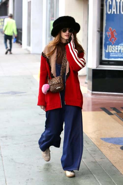 Ashlee Simpson donned a cozy red sweater with white stripes running down the arms. (Backgrid)