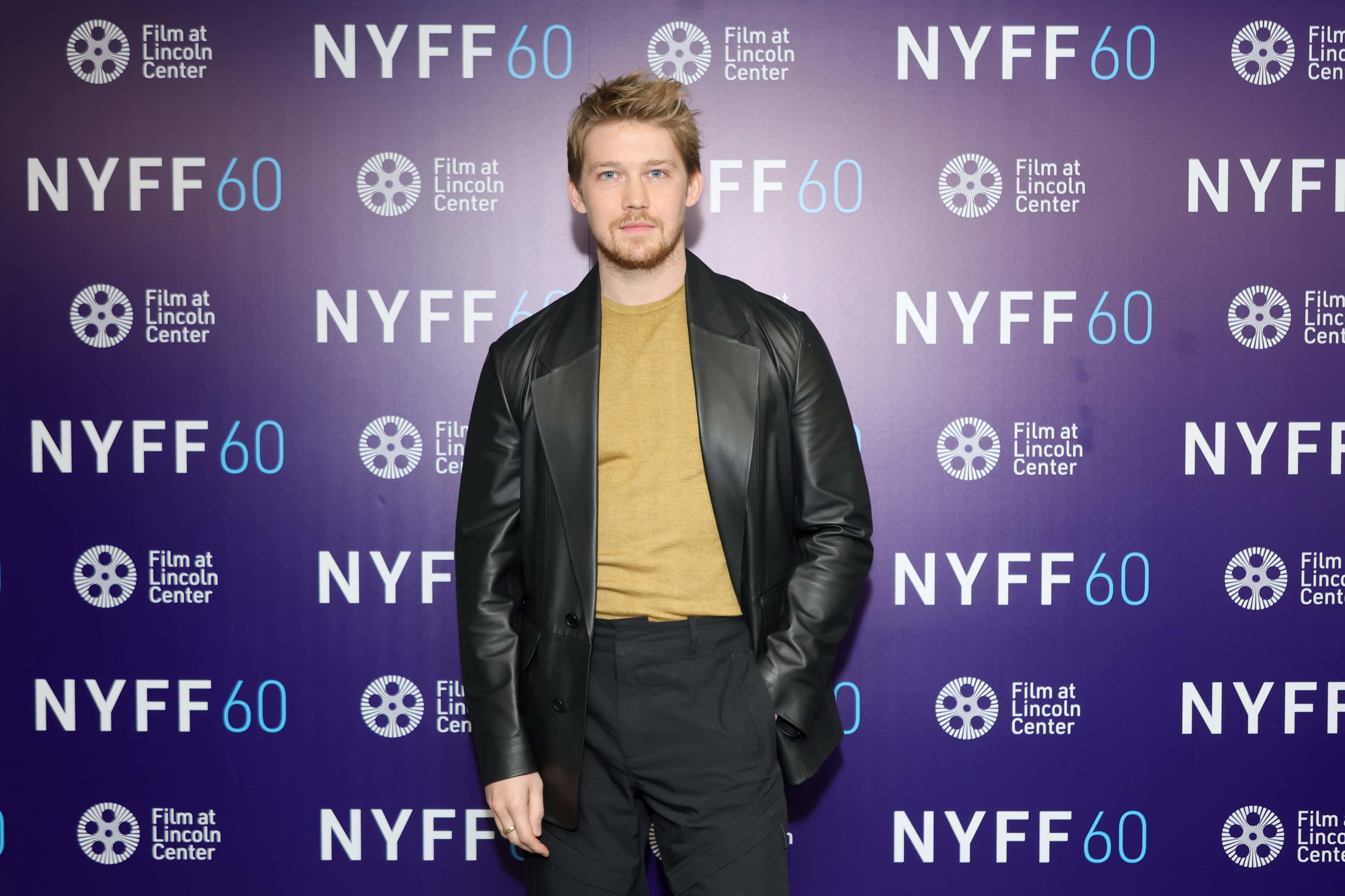 Joe Alwyn poses prior to a screening of 