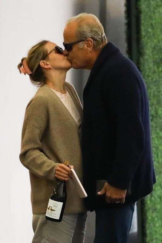 Kelsey Grammer kissed his wife Kayte Walsh as they headed home after romantic date in Beverly Hills on the night of May 24 (Backgrid)