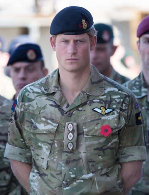 A remembrance poppy adorns the uniform of Prince Harry as he joins British troops and service personal remaining in Afghanistan and also International Security Assistance Force (ISAF) personnel and civilians as they gather for a Remembrance Sunday service at Kandahar Airfield November 9, 2014 in Kandahar, Afghanistan. As the UK combat mission in Afghanistan draws to an end in 2014 this year, which also marks the 100th anniversary of the start of World War One, 70 years since the D-Day landings will be the last time British service personal will gather in any great numbers in the south of the country.