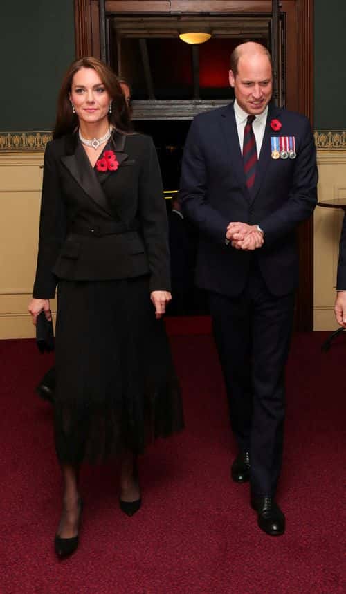 Britain's Prince William, Prince of Wales, and Catherine, Princess of Wales arrive to attend the Royal British Legion Festival of Remembrance at Royal Albert Hall on November 12, 2022 in London, England.