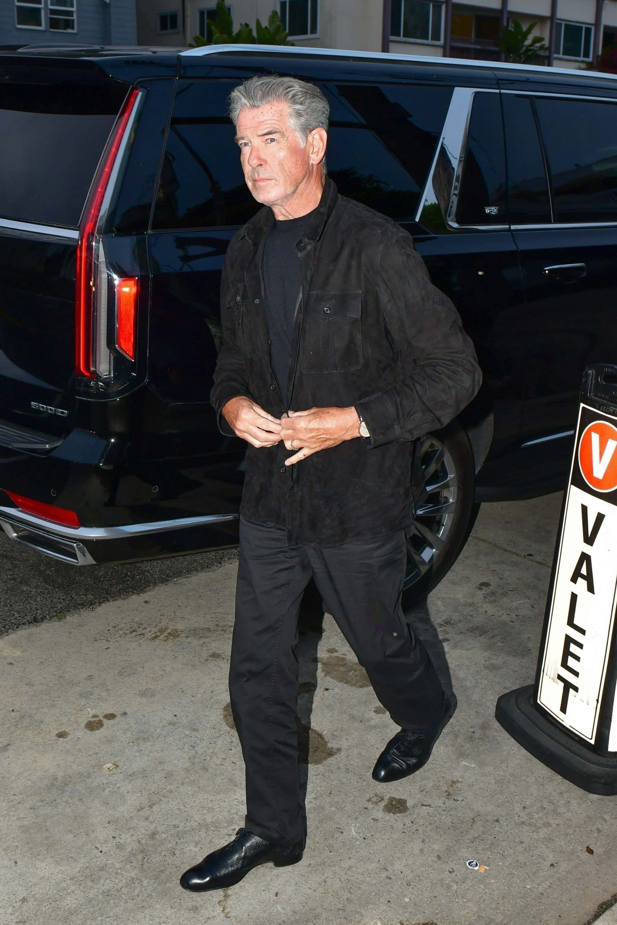 Pierce donned a black jacket, jeans and a T-shirt, with his trademark silver fox locks swept in a neat comb (backgrid)
